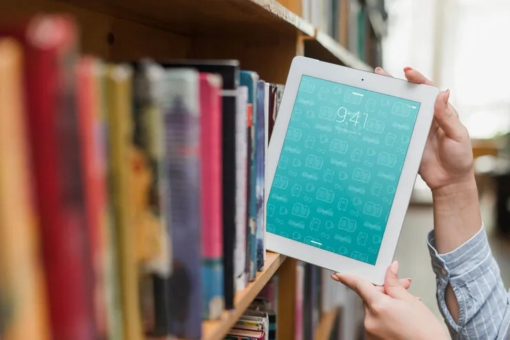 ebook reader placed on a bookshelf