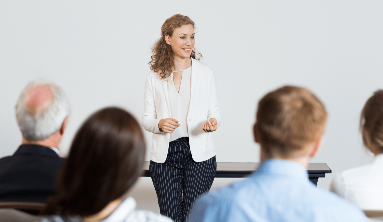 woman giving a presentation in public