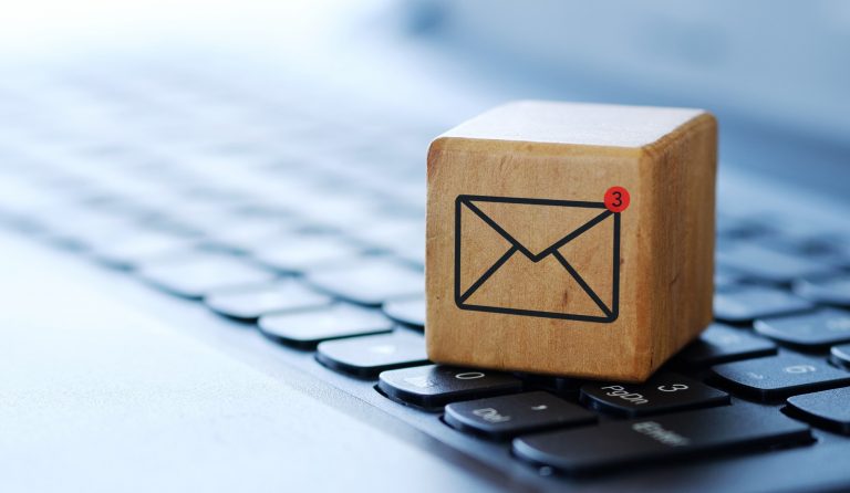 wooden cube with envelope icon