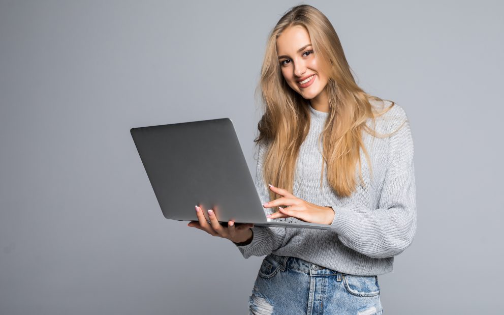 copywriter carrying a laptop